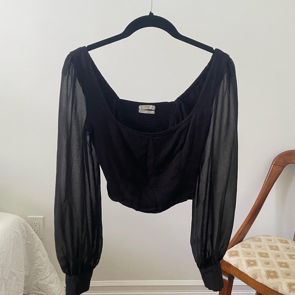 Black blouse with sheer sleeves